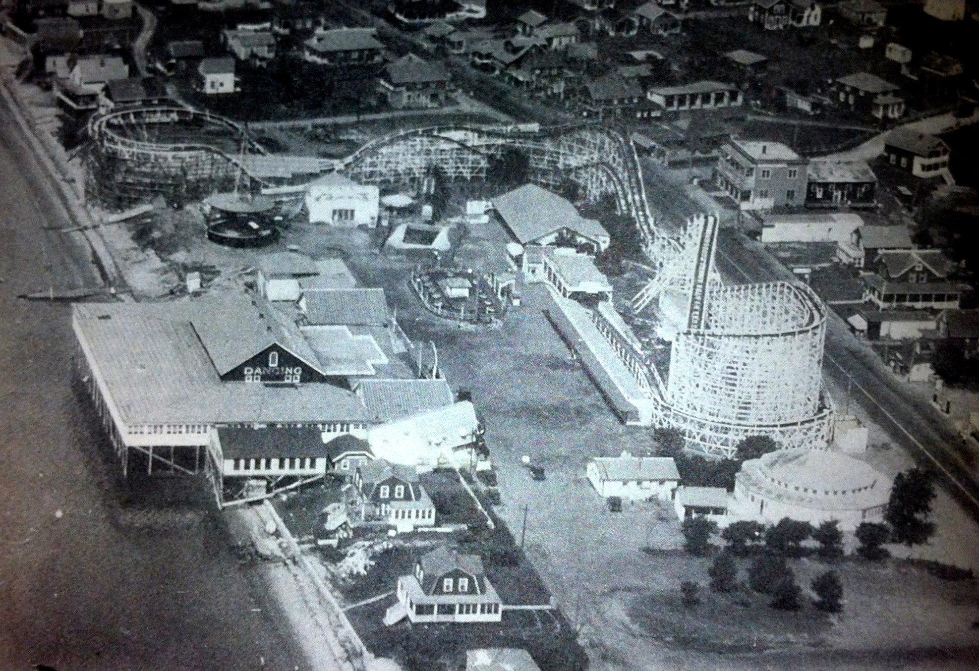 This aerial photo of the Island Park amusement park, dated from about 1927, is from Jim Garman’s collection.You can see the dance hall at left, along with the rollercoster, midway, merry-go-round and other structures.