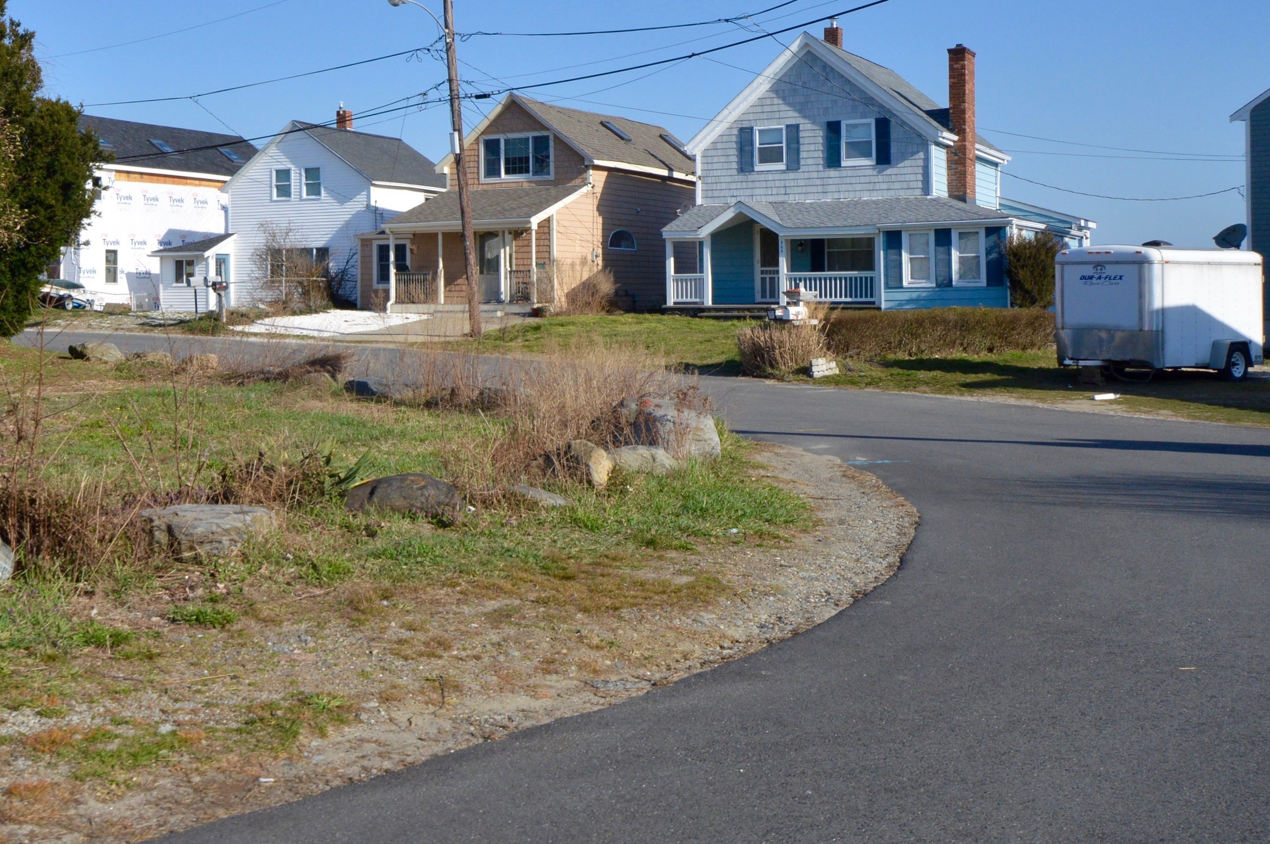 A section of Riverside Street overlooking Blue Bill Cove in Island Park has developed into “chaos” over the last few years due to short-term rentals, a resident complained to the Town Council Monday night.