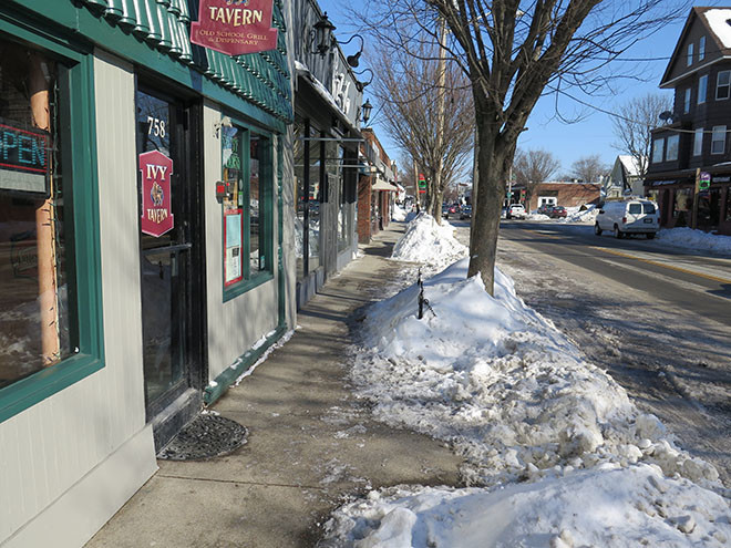 Excessive snowfall seriously impeded parking and hurt businesses.