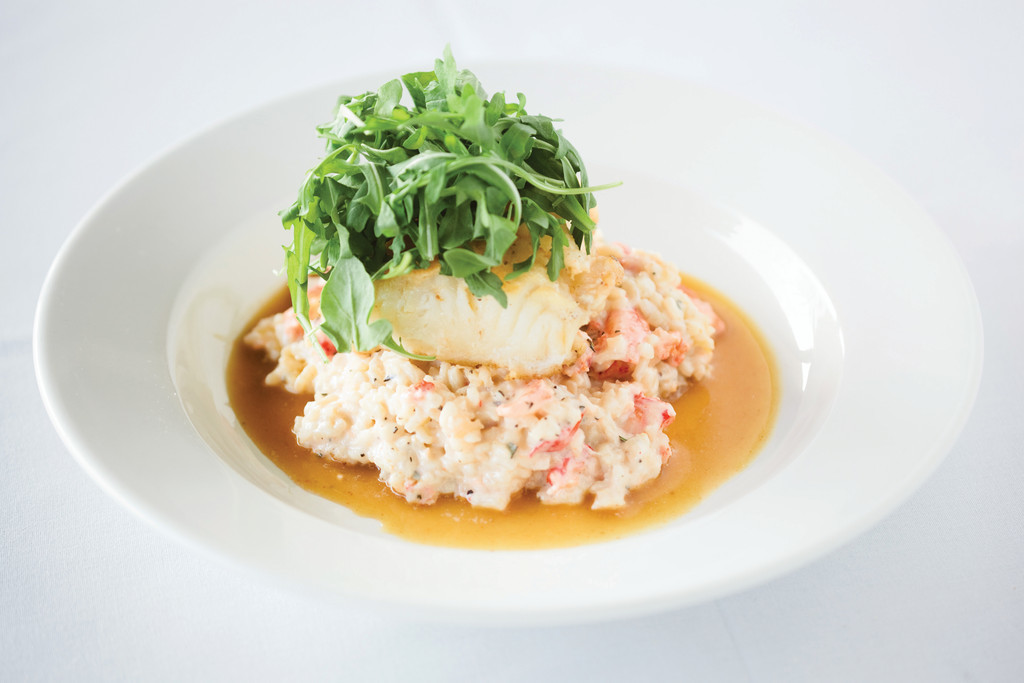 Spigola: Chilean Sea Bass, served over lobster risotto
with a saffron shrimp broth