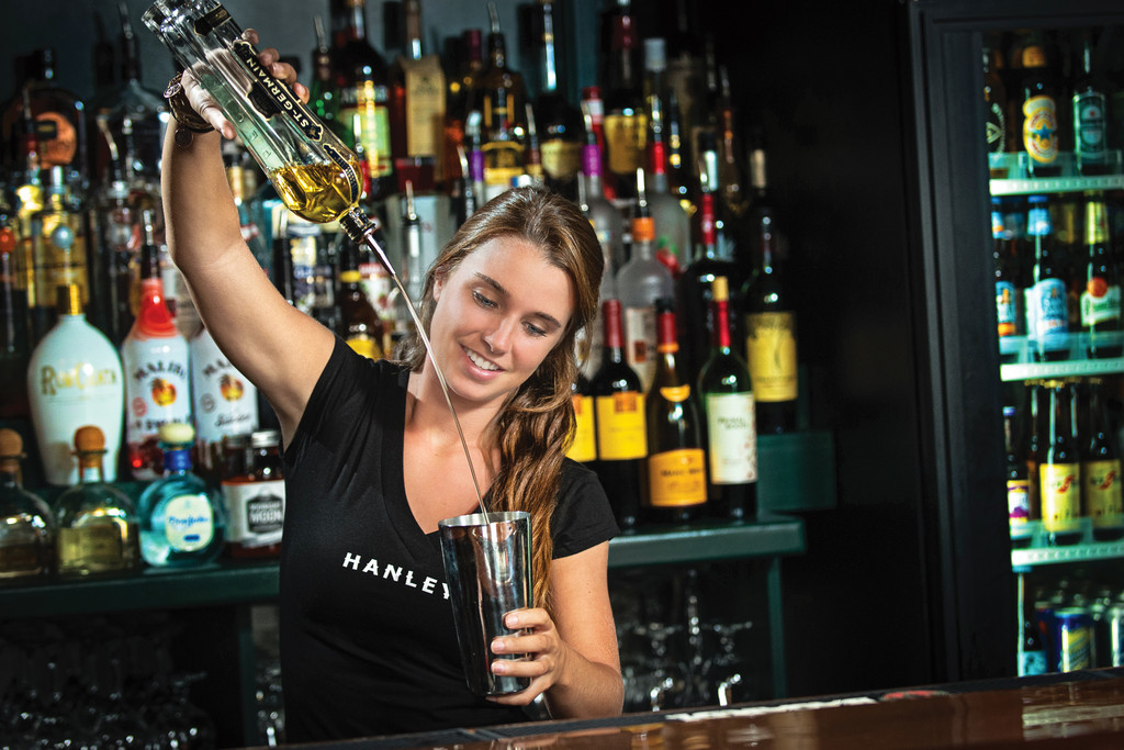 Julia Shackleton mixes up her signature cocktail at Hanley’s ale House & Cigar bar
￼