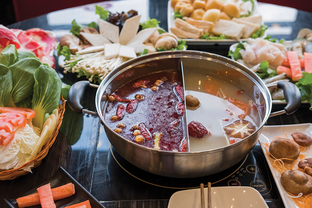The half and half pot lets you have two different cooking broths at LaMei