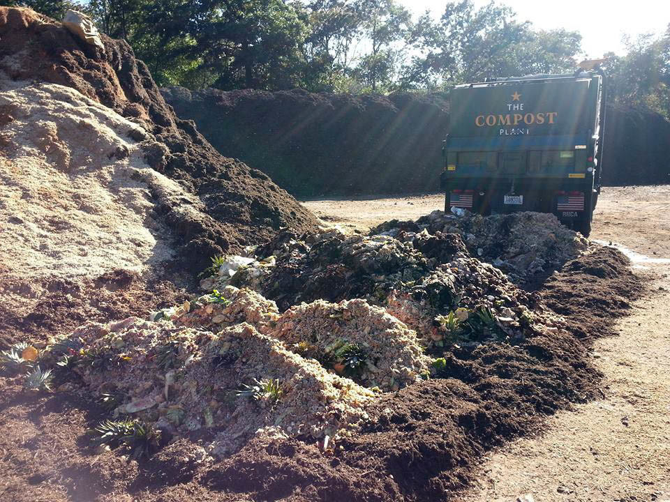 File photo of compost being unloaded.