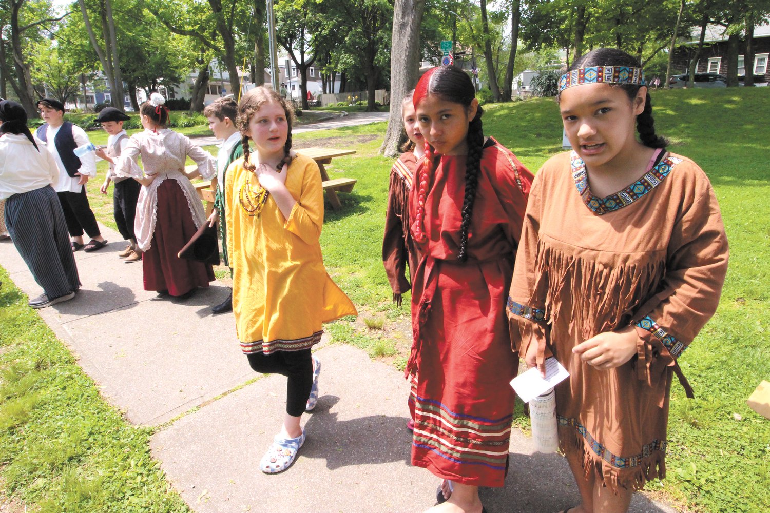 PORTRAYING NATIVE AMERICANS: Fifth grade students from Wyman School dressed as Native Americans for Saturday’s waling tour of Pawtuxet.