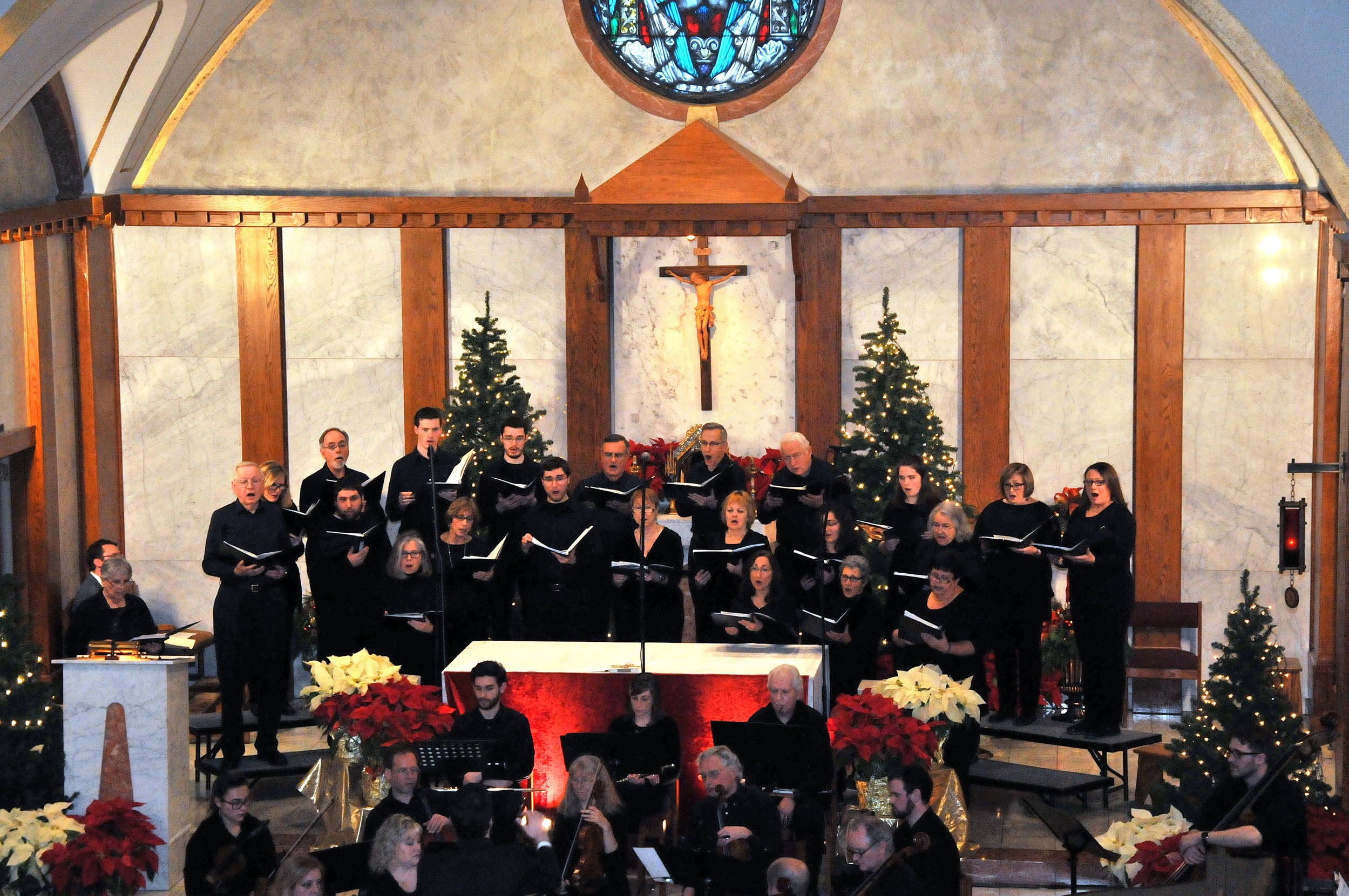 The Our Lady of Mt. Carmel Church Choir performs during Sunday's Epiphany Concert.
