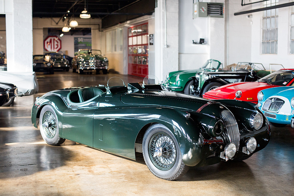 A 1953 Jaguar XK120 is one of the many envy-inducing vintage cars in Oxford Motorcars' showroom