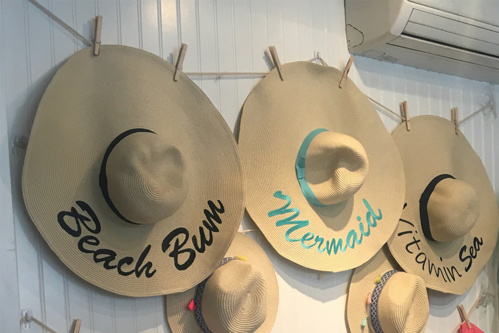 Funky beach hats from Pink Pineapple are a must this summer