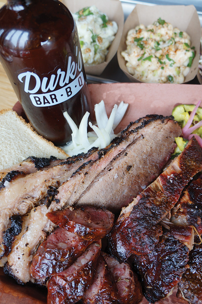 Pair your juicy brisket with a selection from the wall of whiskey at Durk’s Bar-B-Q in Providence