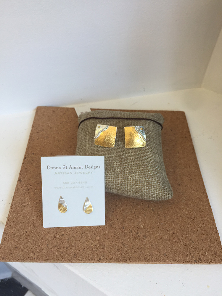 Jewelry by Donna St. Amant: small earrings $76; larger square earrings $280