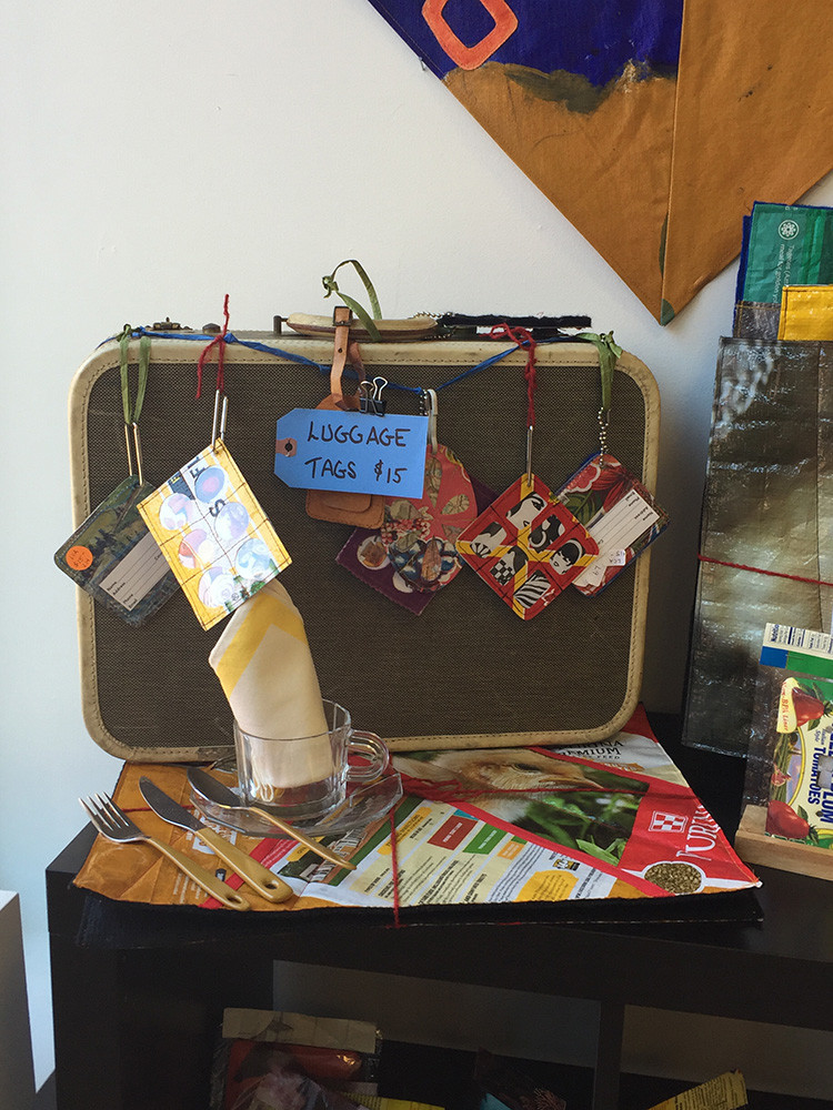 Luggage tags by Lisa Abbatomarco, $15; Placemats, $40