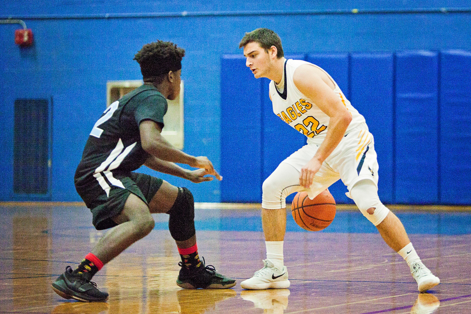 Barrington's Reid Nolan looks to drive past a Holy Name player.
