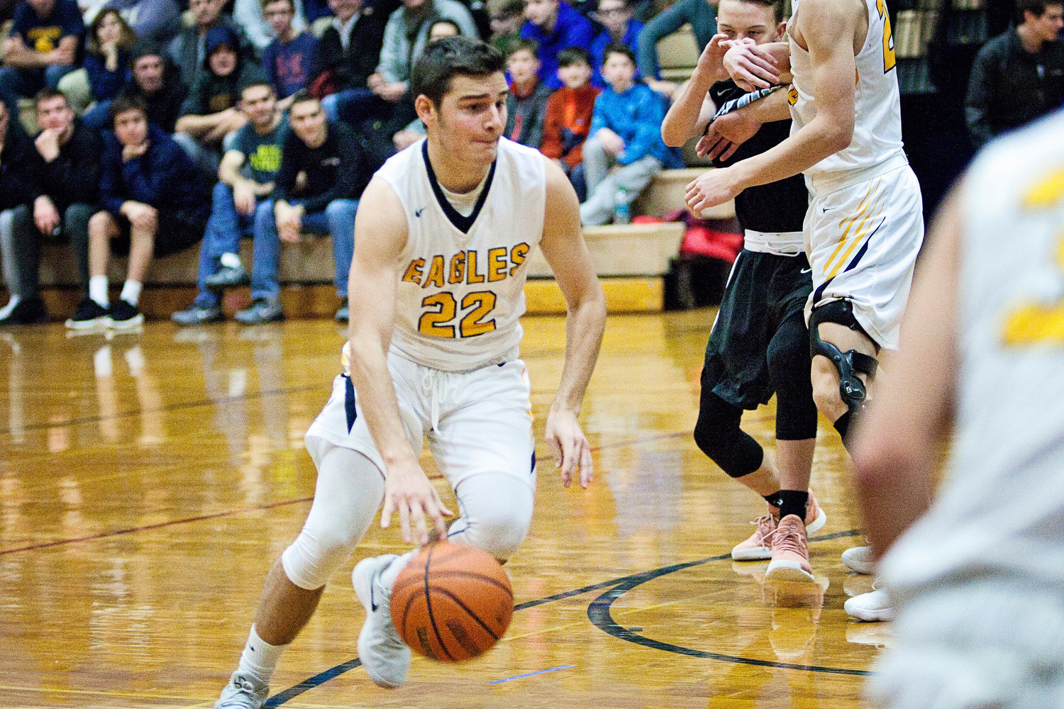 Barrington's Reid Nolan drives toward the basket during the Eagles' game against Holy Name on Wednesday night, Dec. 27.