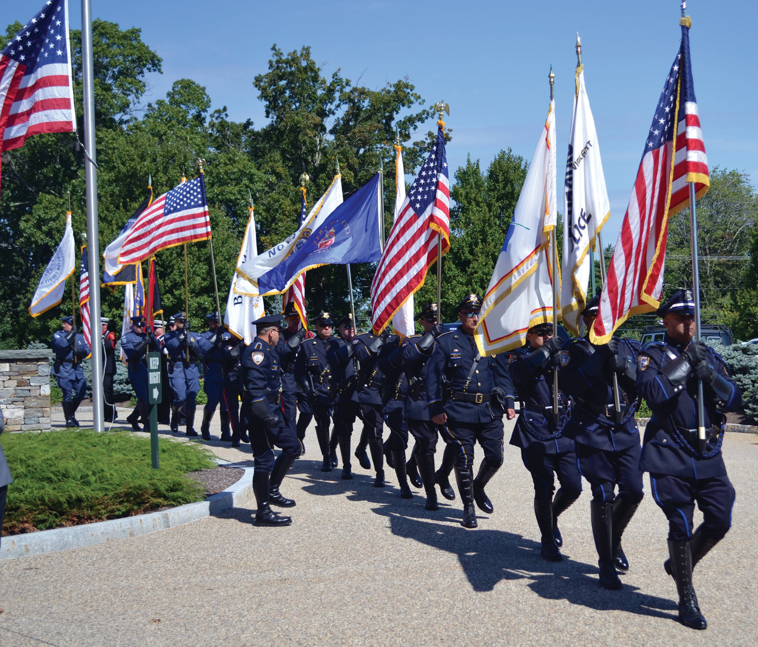MARCHING OUT: The Honor Guard, comprised of members of several departments including Providence and Cranston, recessed as Monday’s ceremony came to a close.