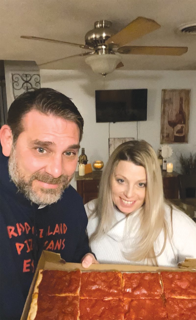 TRY A SLICE: Brian and his wife, Vanessa,
started the Facebook group Rhode Island
Pizza Fans which gives recommendations
on great pizzerias across the state.