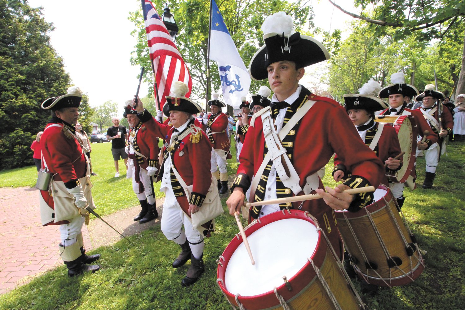 CALLING THE ASSEMBLY TO ORDER:  The Pawtuxet Rangers marched to the park signaling the noon start to Gaspee Days festivities.